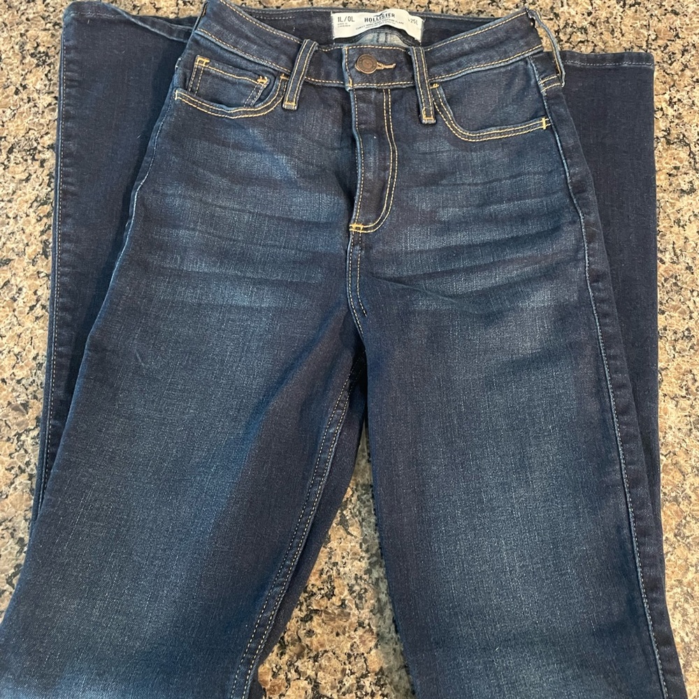 Hollister Women's Flare Leg Jeans in Deep Blue